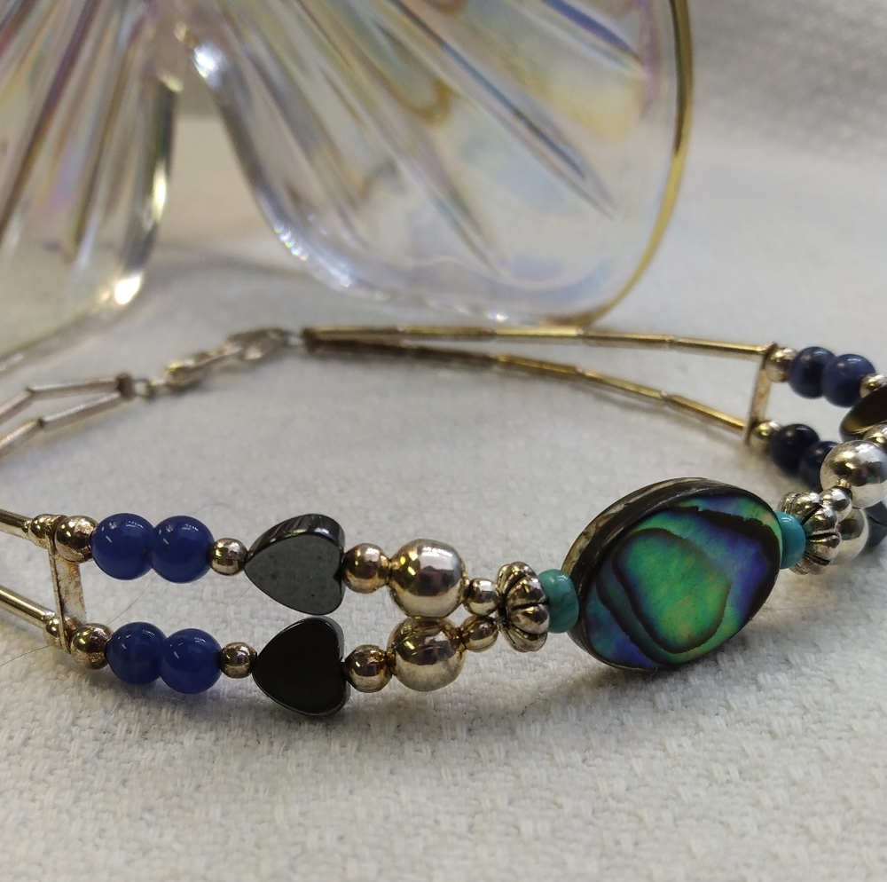 Women's multi stone bracelet with silver tone accents. 8". Good used condition. - Picture 5 of 11